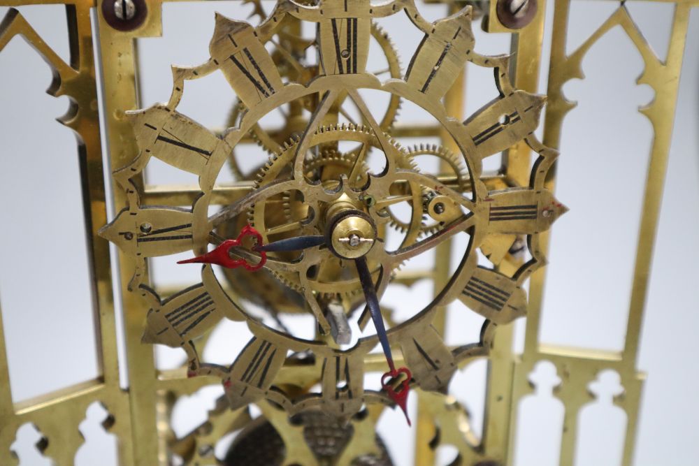 A Victorian single fusee skeleton clock, featuring four-wheel in-line train, makers label Boddington, Manchester, 40cm high
